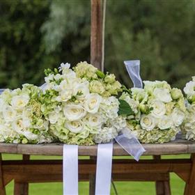 fwthumbBM 12 wedding flowers on table.jpg